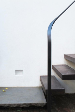 Minimalist Floating Stair with Steel handrail