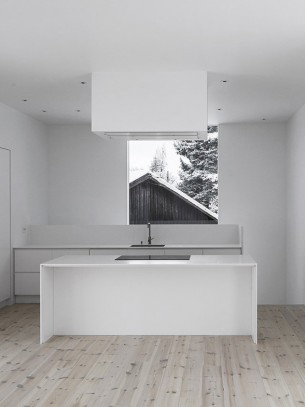 Minimalist White Kitchen with Framing Window